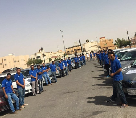 Safari Telecom sales fleet lined up before a route
